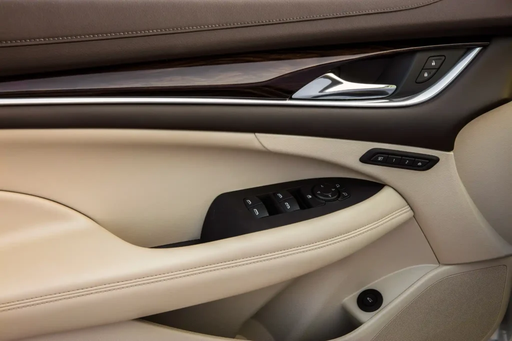 2017 Buick LaCrosse beige leather driver side door panel with power window controls and premium wood trim 2017 Buick LaCrosse beige leather driver side door panel with power window controls and premium wood trim