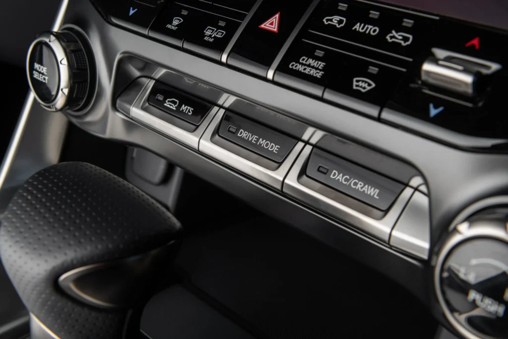 2025 Lexus LX 700h drive mode and MTS control buttons with premium interior detail for luxury SUV driving 2025 Lexus LX 700h drive mode and MTS control buttons with premium interior detail for luxury SUV driving