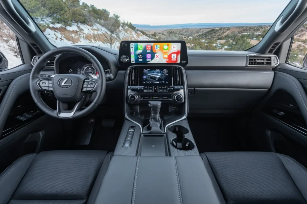 Interior dashboard view of 2025 Lexus LX 700h with touchscreen infotainment Apple CarPlay and premium leather finish Interior dashboard view of 2025 Lexus LX 700h with touchscreen infotainment Apple CarPlay and premium leather finish