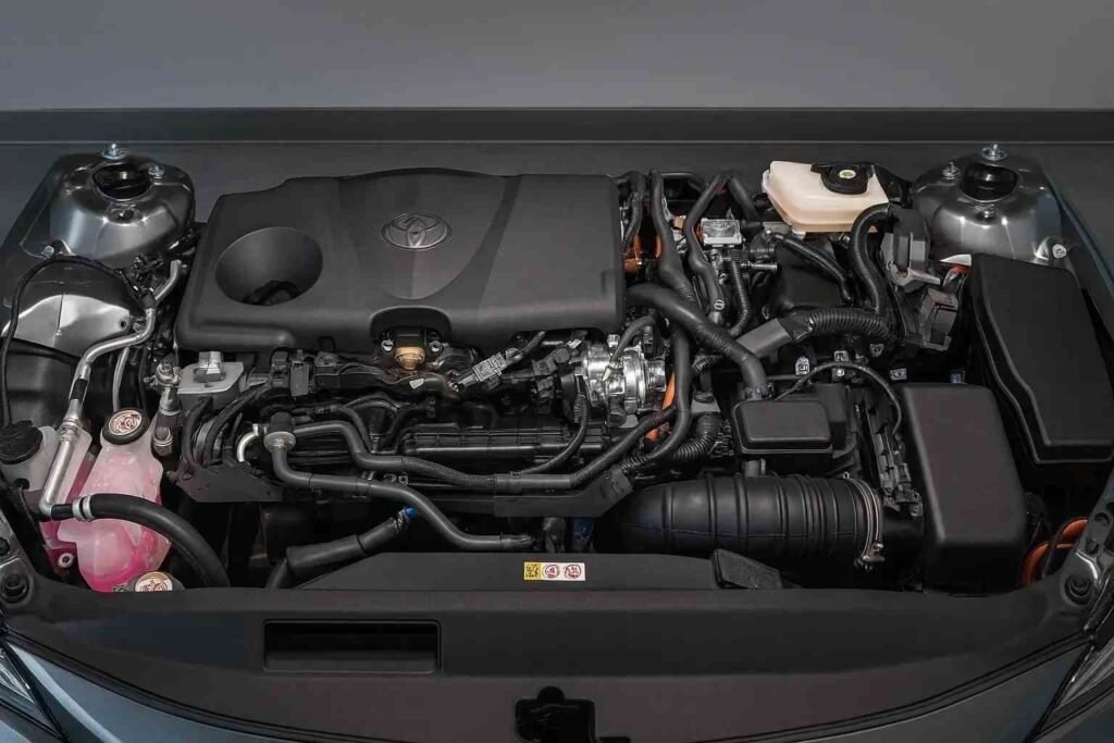 2025 Toyota Camry sedan rolling through suburban boulevard bold grille and LED headlights composed ride everyday commuter refinement 2025 Toyota Camry sedan rolling through suburban boulevard bold grille and LED headlights composed ride everyday commuter refinement
