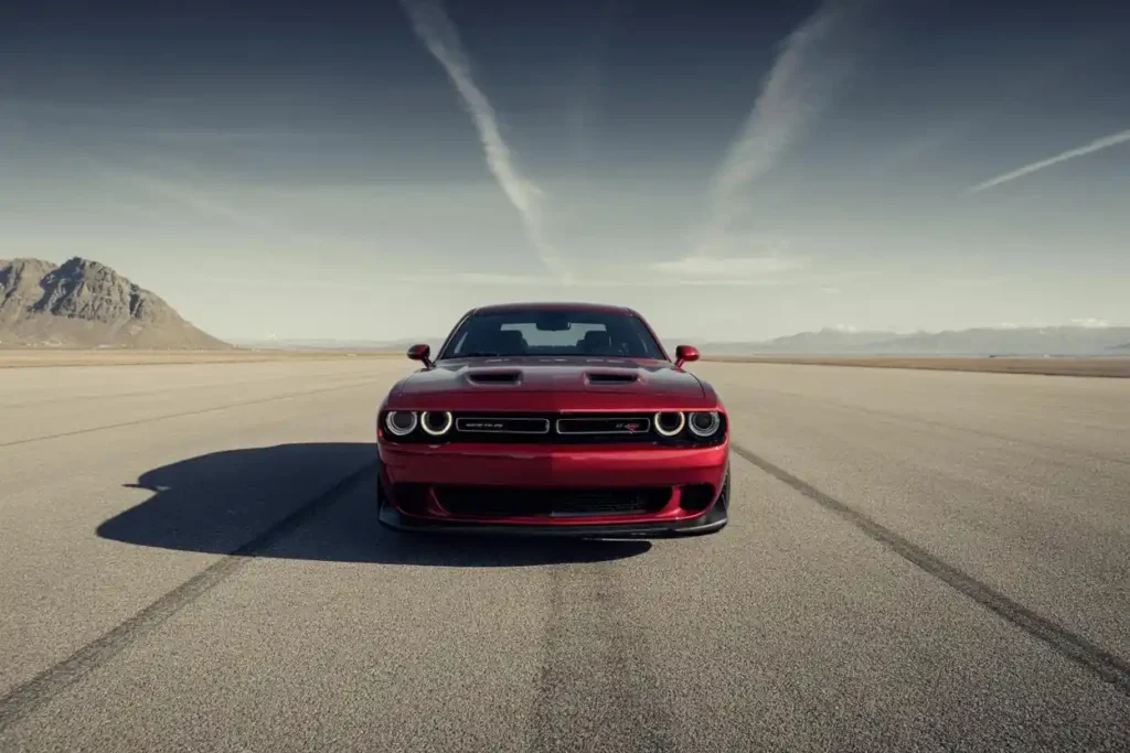Full cabin front view of 2015 Dodge Challenger SRT 392 showing tan leather seats SRT steering wheel and performance touchscreen Full cabin front view of 2015 Dodge Challenger SRT 392 showing tan leather seats SRT steering wheel and performance touchscreen