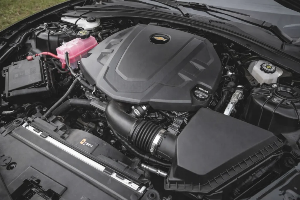 2017 chevrolet camaro v6 overhead engine bay view with chevrolet branded engine cover and coolant reservoir 2017 chevrolet camaro v6 overhead engine bay view with chevrolet branded engine cover and coolant reservoir