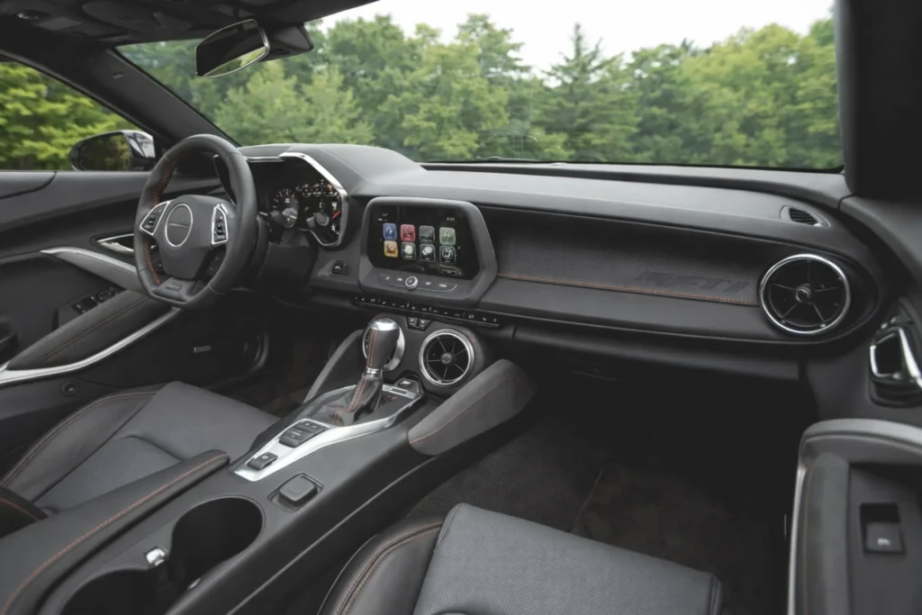 2017 chevrolet camaro v6 wide passenger side interior view with cockpit dashboard and trees outside 2017 chevrolet camaro v6 wide passenger side interior view with cockpit dashboard and trees outside